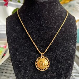 Sugar Blossom gold-tone  pendant necklace. “ Live by the sun, love by the Moon”